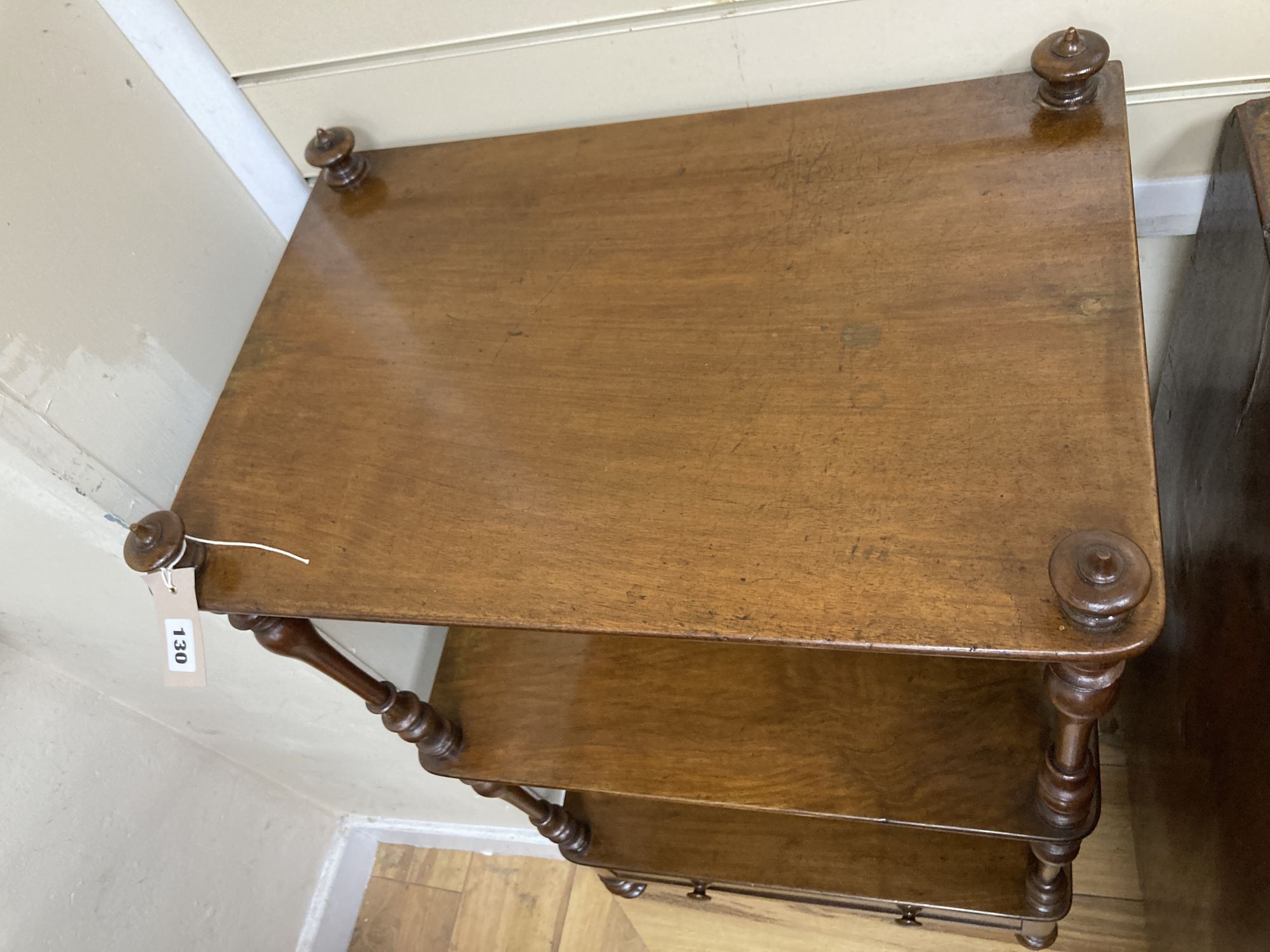A Victorian mahogany three tiered whatnot with drawer, width 56cm, depth 37cm, height 104cm